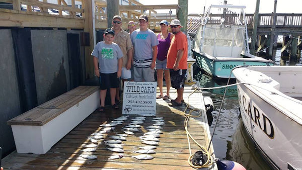 Inshore Outer Banks charter anglers showing off their catch.