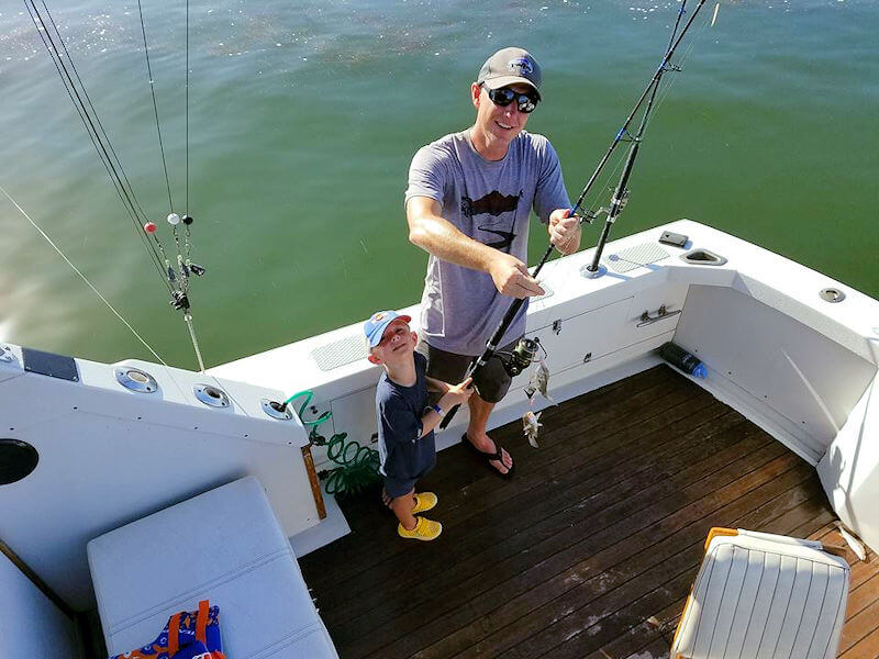 Picture of a family enjoying a great time on an inshore charter trip.