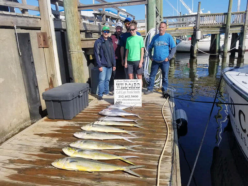 Great Outer Banks charter group showing off their fish catch.